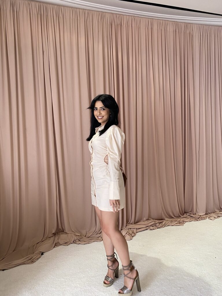 Unveiling her largest oil painting at a public event, Anais Amin showcases talent in Los Angeles, California.